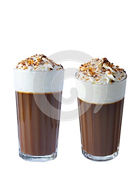 Cappuccino coffee with whipped cream in chocolate crumb and roasted nuts. Isolate on a white background.
