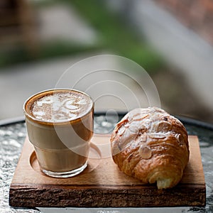 Cappuccino with croisant photo