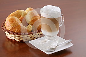 Cappuccino and croissants photo