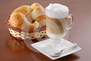 Cappuccino and croissants photo