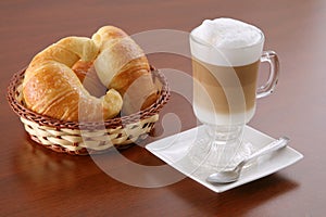 Cappuccino and croissants photo