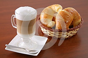 Cappuccino and croissants photo