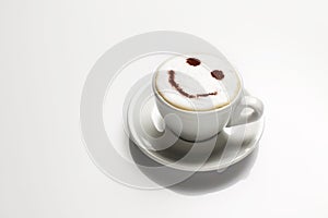 Cappuccino with face in froth