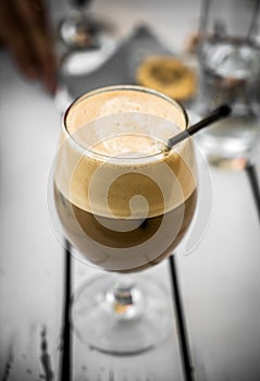Cappuccino Freddo Coffee in Glass with straw photo
