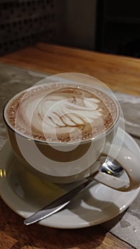 Cappuccino or moccacino latte photo