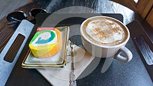 Cappuccino and traditional Korean cake