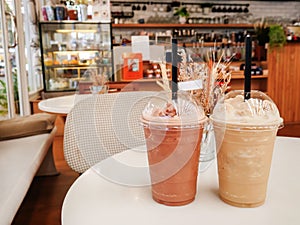 Cappucino Frappe and Frappuccino on white table