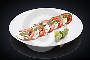 Caprese salad with basil