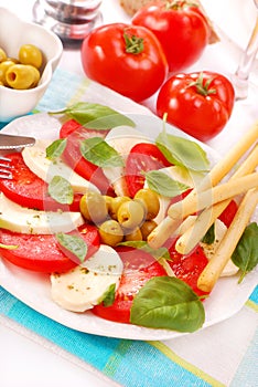 Caprese salad with grissini