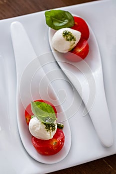 caprese salad mozzarella cheese, tomato basil leaf italian snack copy top view keto or paleo dietveggie vegetarian food