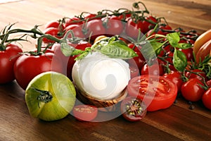 Caprese salad with tomatoes, fresh mozzarella and basil