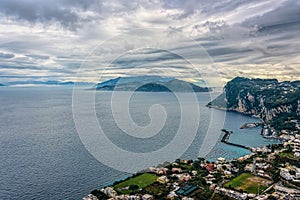 Capri Island view under cloudy sky after storm