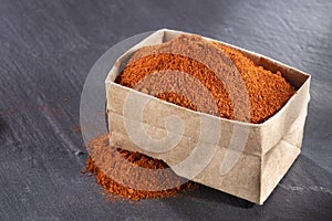 Capsicum annuum - Organic paprika powder in paper bag