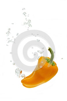 Capsicum in water with air bubbles