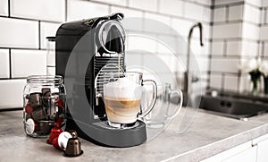 Capsule coffee machine at domestic kitchen