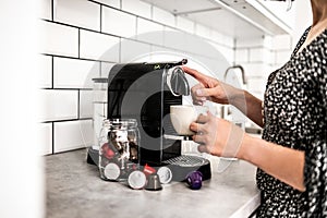 Capsule coffee machine at domestic kitchen