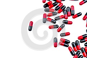 Capsule pills spread on white background. Antibiotic drug use with reasonable. Pharmaceutical industry. Pharmacy background. photo
