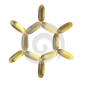 Capsules of fish fat oil in sun shape isolated on white background. Omega 3 pills