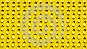 Capsules pill with vitamin D on yellow background close-up. Fish oil, Omega, Omega-3, dietary supplement, sunshine vitamin.
