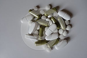 Capsules, tablets and caplets in a heap