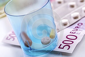 Capsules up ticket euro, concept of health copay photo