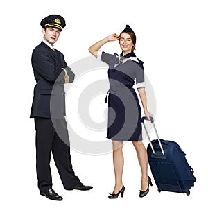 Captain of the aircraft and a beautiful flight attendant in a da