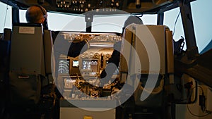Captain and copilot inserting destination coordinates