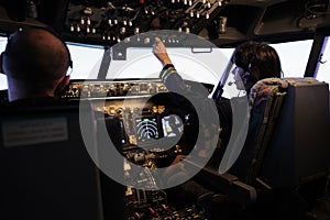 Captain and copilot switching power engine buttons on dashboard