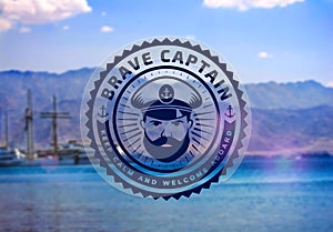 Captain logo on blurred background.