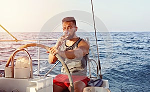 Captain man yachting with glass of wine. Summer leisure activity