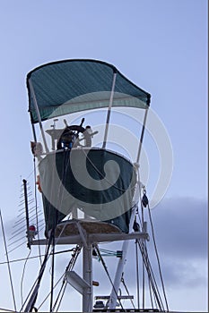 A captain`s bridge with awning of a fishing boat