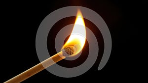 CloseUp View of a Single Match Igniting a Flame A Powerful Reminder of Fire Safety photo