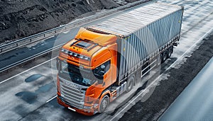 Orange Scania truck on a highway bridge photo