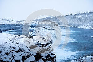 The captivating landscape of Faxafoss waterfall with its natural beauty and peaceful surroundings. photo