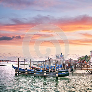 Captivating landscape of Riva degli Schiavoni with parked gondolas in Venice. Popular tourist destination