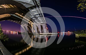 Captivating night view of the illuminated Woodrow Wilson Memorial Bridge crossing the Potomac River