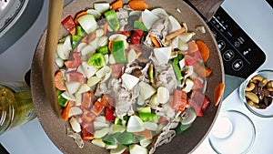 Captivating Overhead Footage of Sizzling Stir-Fry in a Modern Kitchen