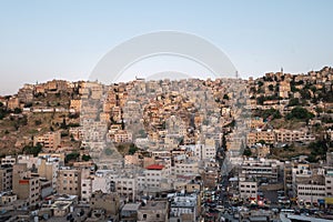 Captivating skyline of Amman, Jordan traditional houses atop a picturesque hill