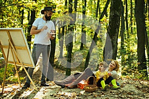 Capture moment. Beauty of nature. Bearded man woman and son relax autumn nature. Drawing from life. Painter artist with