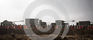 Captured by enemy concept. Military silhouettes and crowd on war fog sky background. World War Soldiers and armored vehicles