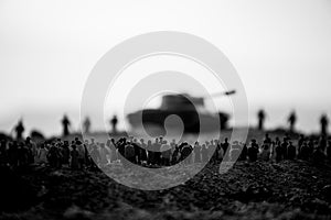 Captured by enemy concept. Military silhouettes and crowd on war fog sky background. World War Soldiers and armored vehicles