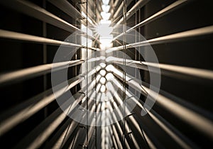 Captures the blinds at an angle, emphasizing the play of light and