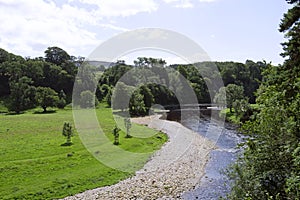 Bridge over the River Wharfe, in Wharfedale, in the Yorkshire Dales, England. photo
