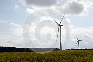 Wind turbines, in rape seed oil fields, in Marr, Doncaster, South Yorkshire. photo