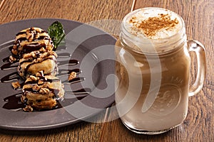 Capucchino Coffe with argentinian alfajores photo