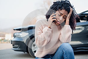 Car accident and black woman calling help