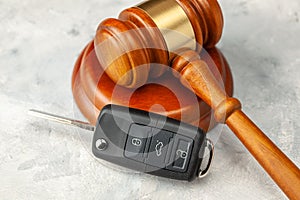 Car accident. Judge gavel and car bleeding with alarm. Car Insurance Solution