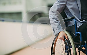 A disable man on wheelchair. photo