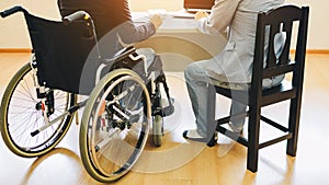 After car accident and rehabilitation, disabled people can return to work and get job again.The company which employing disabiliti photo