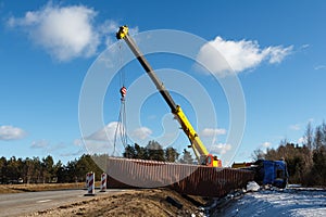 Car accident on a road in February 22, 2019, cargo vehicle drove off the road and turned upside down